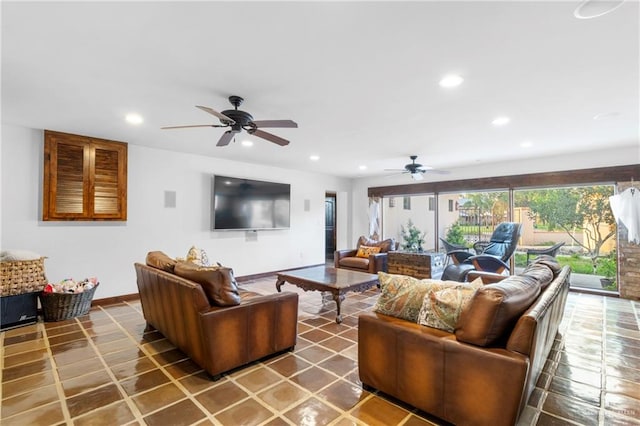 tiled living room featuring ceiling fan