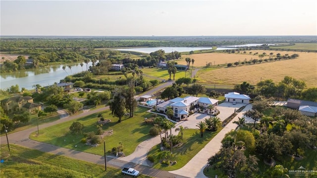 aerial view with a water view and a rural view