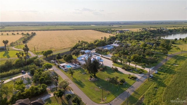 bird's eye view with a rural view and a water view