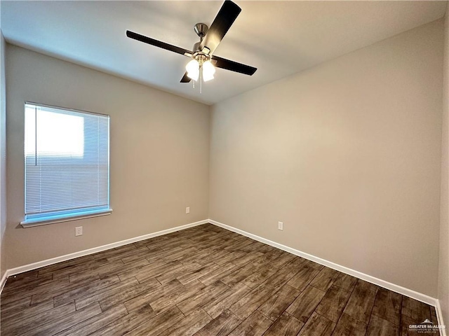 empty room with ceiling fan and wood-type flooring