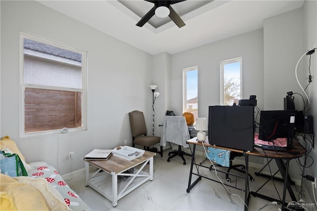 915 Rockford Dr, Alton, TX 78573 - home office featuring a ceiling fan and baseboards