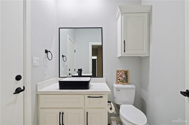 915 Rockford Dr, Alton, TX 78573 - bathroom featuring toilet and vanity