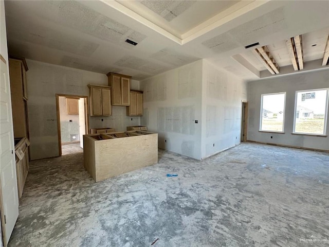 kitchen featuring light brown cabinetry