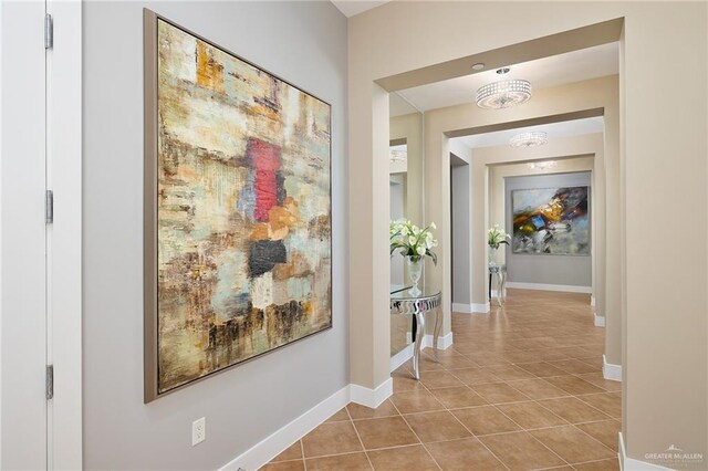 310-A Padre Blvd Unit 3102, South Padre Island, TX 78597 - hallway with tile patterned flooring and baseboards