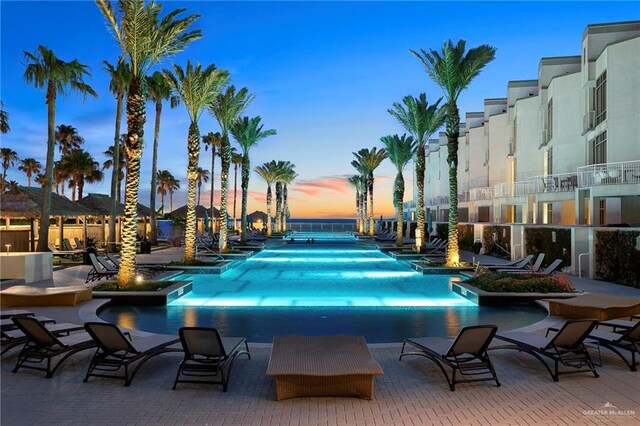310-A Padre Blvd Unit 3102, South Padre Island, TX 78597 - community pool featuring a patio area