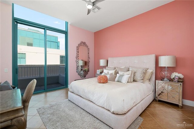 310-A Padre Blvd Unit 3102, South Padre Island, TX 78597 - tiled bedroom featuring access to outside, baseboards, and ceiling fan