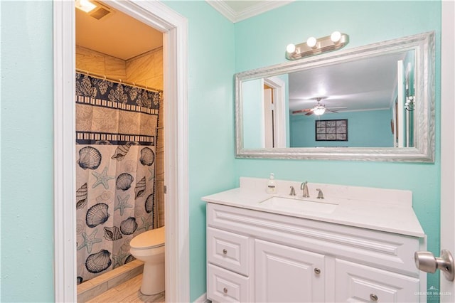 bathroom featuring ornamental molding, vanity, ceiling fan, wood-type flooring, and toilet