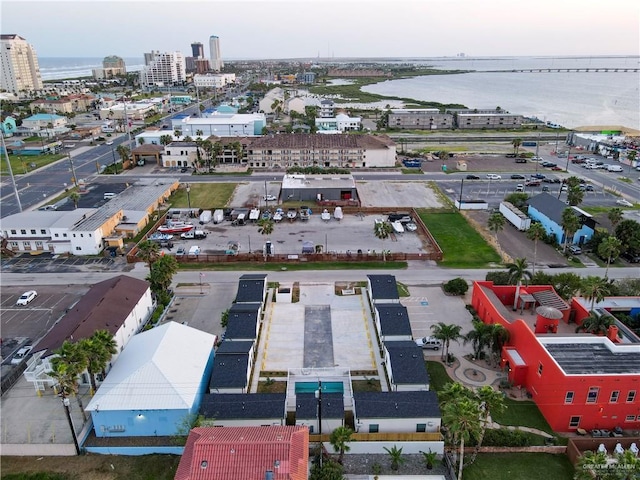 bird's eye view with a water view