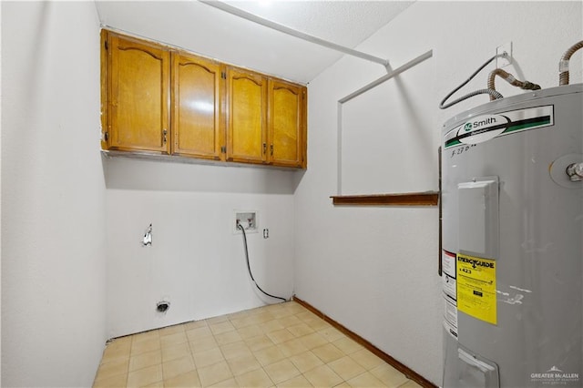 3401 Del Norte Dr, Mission, TX 78574 - clothes washing area with electric dryer hookup, cabinet space, electric water heater, and washer hookup