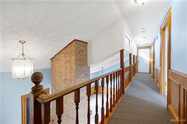 3401 Del Norte Dr, Mission, TX 78574 - hallway featuring a chandelier and carpet