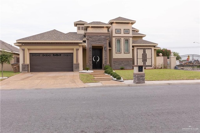 2410 W Vancouver Ave, Edinburg, TX 78539 - prairie-style house with stone siding, an attached garage, driveway, and stucco siding