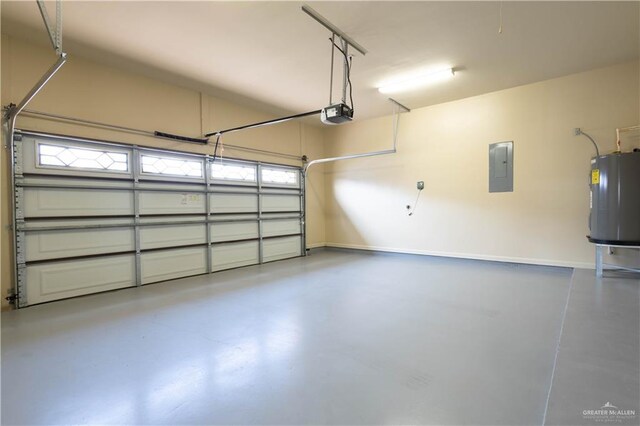 2410 W Vancouver Ave, Edinburg, TX 78539 - garage featuring electric panel, water heater, baseboards, and a garage door opener