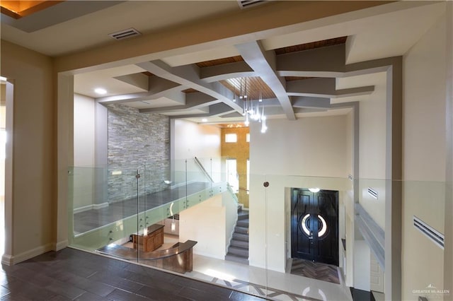 2410 W Vancouver Ave, Edinburg, TX 78539 - staircase featuring beamed ceiling, wood finished floors, and baseboards