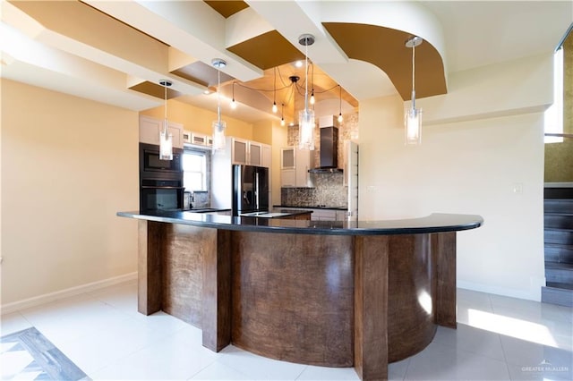 2410 W Vancouver Ave, Edinburg, TX 78539 - kitchen with black appliances, wall chimney range hood, dark countertops, tasteful backsplash, and baseboards