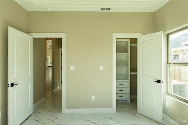 8801 Swan Lake Dr, Harlingen, TX 78550 - unfurnished bedroom with marble finish floor, visible vents, and baseboards