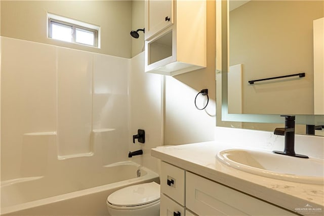 8801 Swan Lake Dr, Harlingen, TX 78550 - bathroom with toilet, shower / bathing tub combination, and vanity