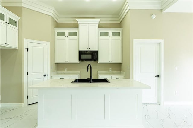 8801 Swan Lake Dr, Harlingen, TX 78550 - kitchen featuring black microwave, marble finish floor, a sink, and crown molding