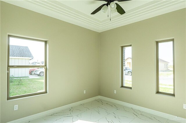 8801 Swan Lake Dr, Harlingen, TX 78550 - empty room featuring marble finish floor, ceiling fan, and baseboards