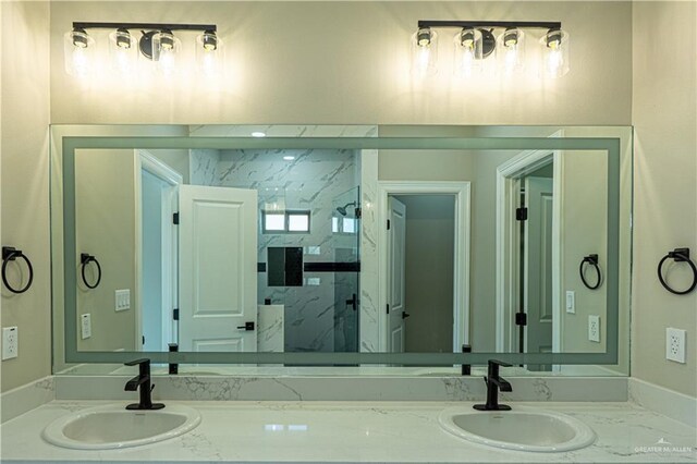 8801 Swan Lake Dr, Harlingen, TX 78550 - bathroom with a marble finish shower and vanity