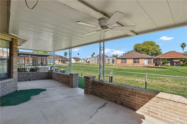 view of patio featuring ceiling fan