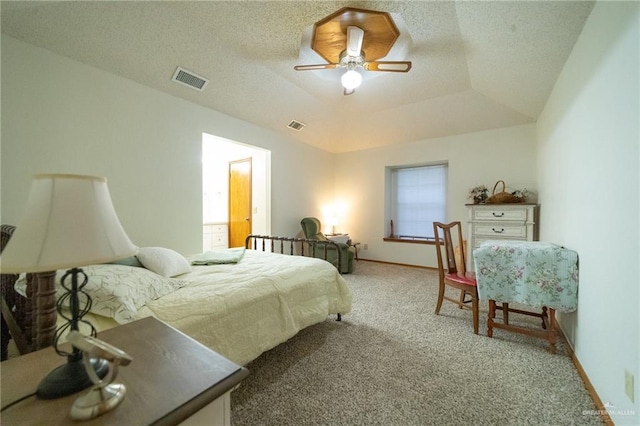 6913 N 31st St, Mcallen, TX 78504 - carpeted bedroom with ceiling fan, a raised ceiling, and a textured ceiling
