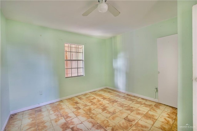 empty room featuring ceiling fan