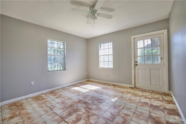 interior space featuring ceiling fan