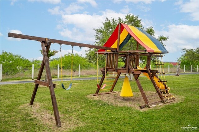 community playground featuring a yard
