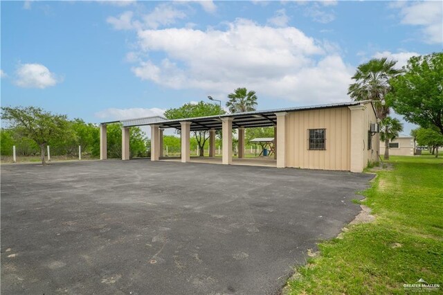view of car parking with a carport