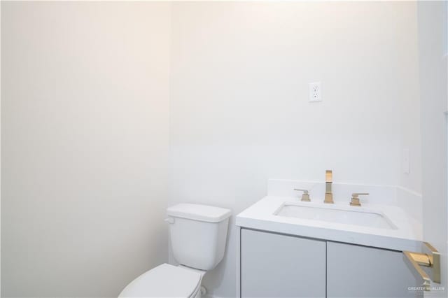 2607 Cottonwood St, Mission, TX 78574 - bathroom featuring vanity and toilet