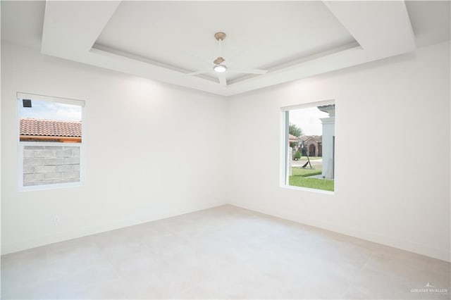 2607 Cottonwood St, Mission, TX 78574 - spare room with a raised ceiling and baseboards