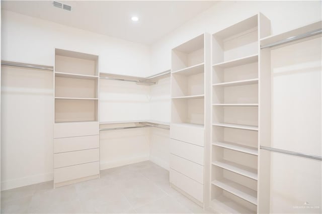 2607 Cottonwood St, Mission, TX 78574 - walk in closet featuring light tile patterned flooring