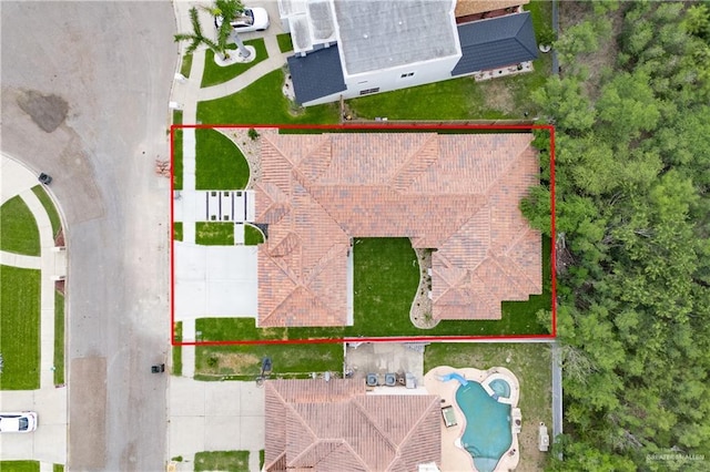 2607 Cottonwood St, Mission, TX 78574 - aerial view of property and surrounding area with property parcel outlined and a pool area