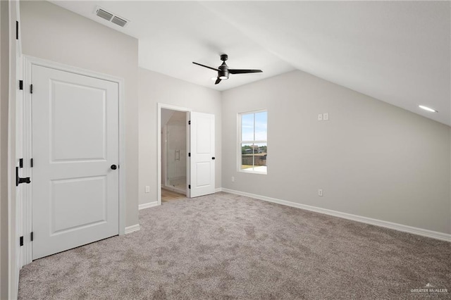 bonus room featuring lofted ceiling, light colored carpet, and ceiling fan