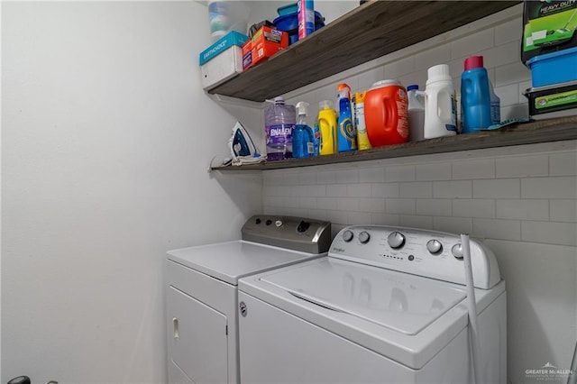 laundry area featuring laundry area and independent washer and dryer