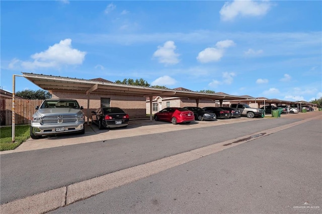 1010 Cedarwood Dr, Rio Grande City, TX 78582 - view of front of property with covered parking and brick siding