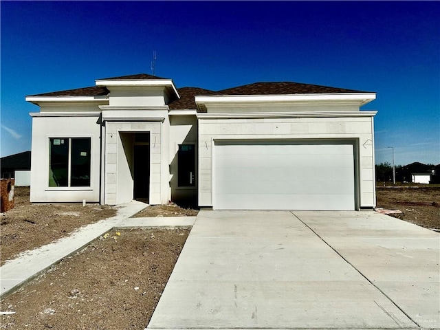 prairie-style house with a garage