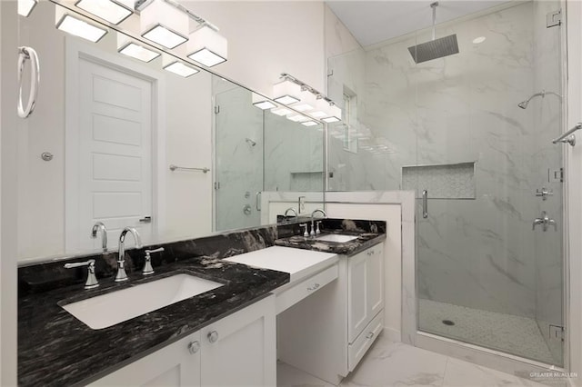 bathroom featuring vanity and walk in shower