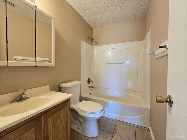 full bathroom with tile patterned floors,  shower combination, a textured ceiling, toilet, and vanity