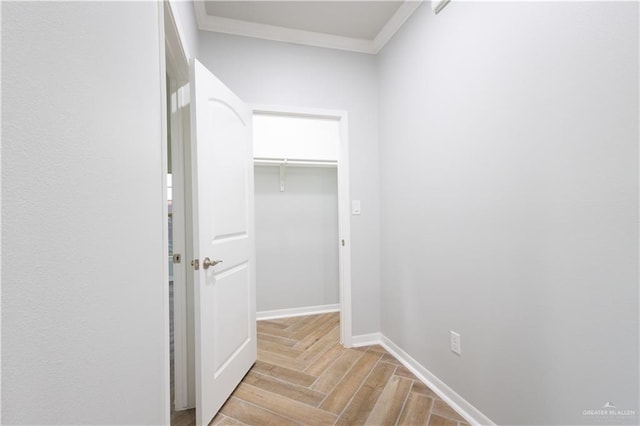 hall featuring crown molding and light parquet floors