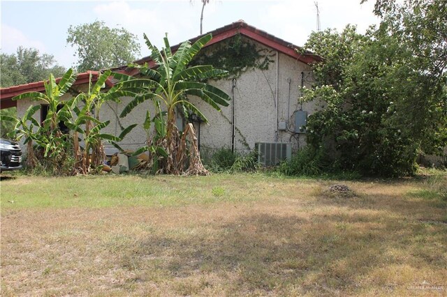 view of home's exterior featuring central AC