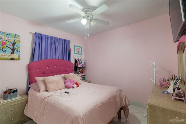 bedroom featuring ceiling fan