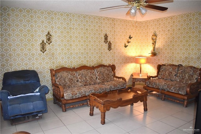 712 N Padre Ave, Weslaco, TX 78596 - living area featuring wallpapered walls, a textured ceiling, ceiling fan, and tile patterned floors