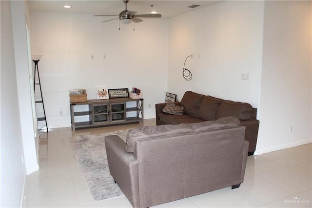 living area with recessed lighting, ceiling fan, visible vents, and tile patterned floors