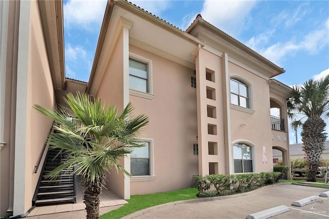 103 Gardenia St Unit 3, South Padre Island, TX 78597 - view of property with uncovered parking