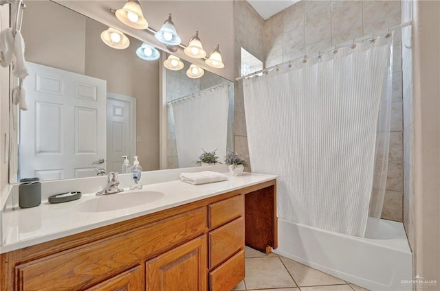 103 Gardenia St Unit 3, South Padre Island, TX 78597 - bathroom with tile patterned flooring, vanity, and shower / bathtub combination with curtain