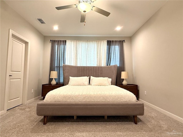 carpeted bedroom with ceiling fan