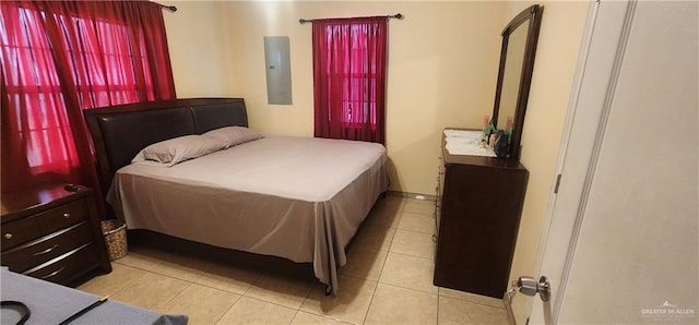 tiled bedroom featuring electric panel