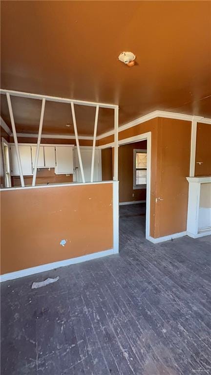 unfurnished room featuring wood finished floors