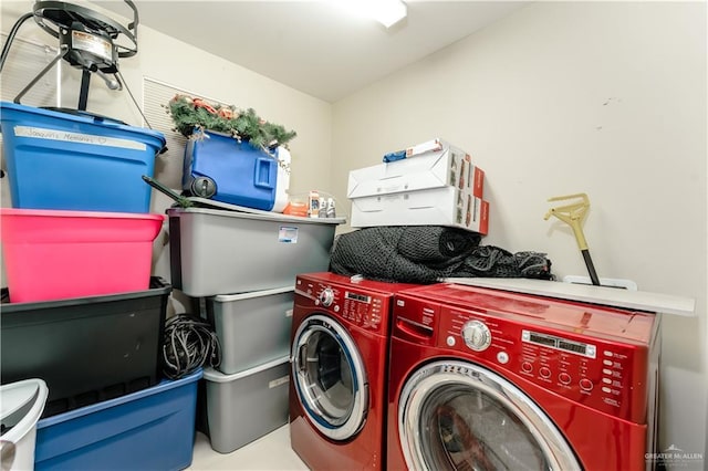 laundry area with laundry area and washer and dryer